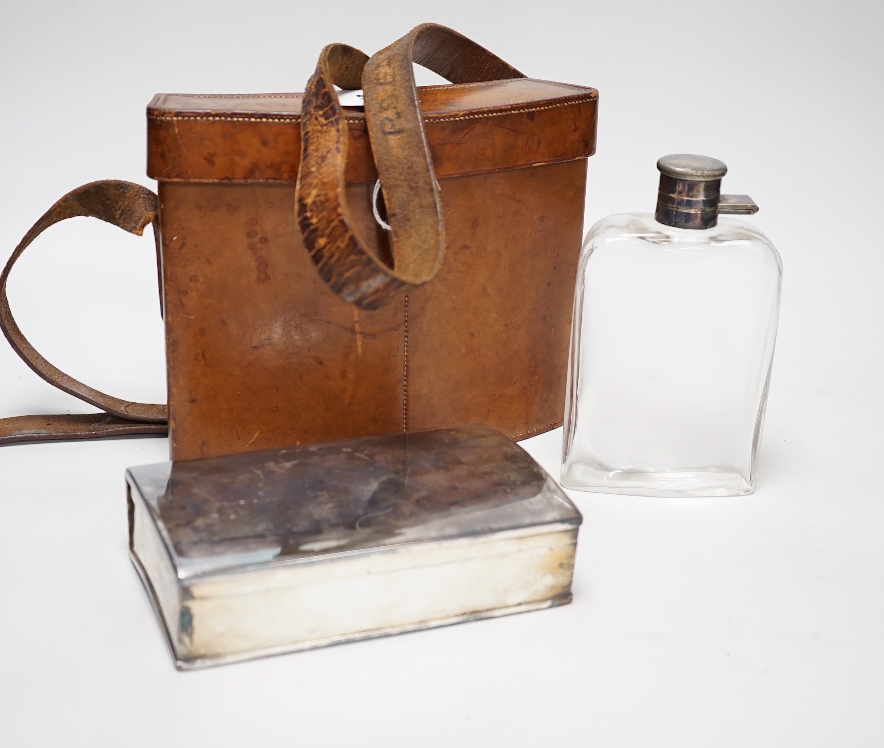 An early 20th century tan leather-cased silver plated hip flask and sandwich box, case 22cm wide